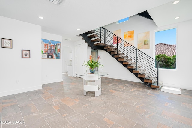4727 Riverglen Blvd, Ponce Inlet, FL 32127 - stairway featuring baseboards and recessed lighting