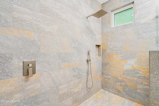 details with a tile shower