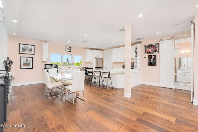 living room with dark hardwood / wood-style flooring and ceiling fan