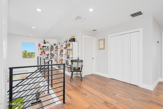 interior space with hardwood / wood-style flooring