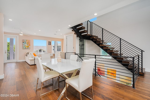 dining area with hardwood / wood-style floors