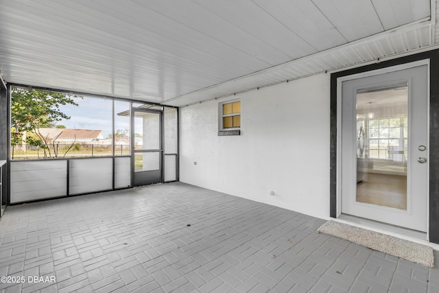 view of unfurnished sunroom