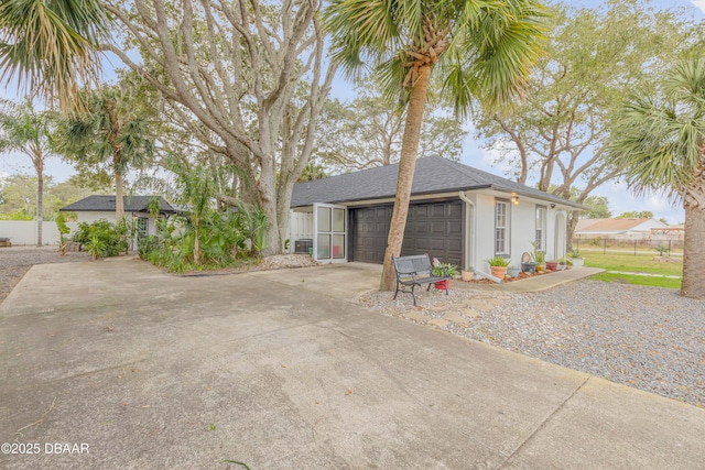 view of front of property with a garage