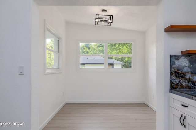 619 Aberdeen St, Daytona Beach, FL 32114 - unfurnished dining area featuring light wood finished floors and baseboards