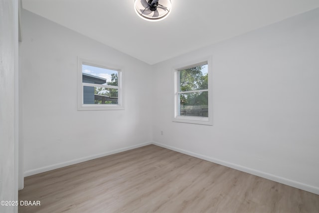 619 Aberdeen St, Daytona Beach, FL 32114 - spare room with plenty of natural light, wood finished floors, and baseboards