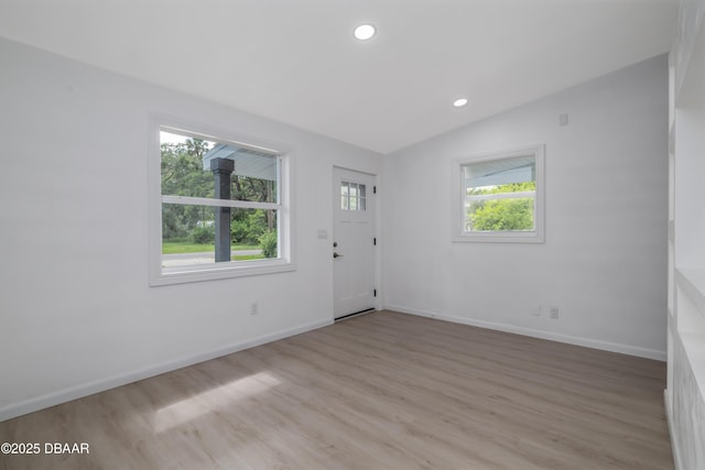 619 Aberdeen St, Daytona Beach, FL 32114 - foyer with lofted ceiling, light wood-style floors, baseboards, and recessed lighting