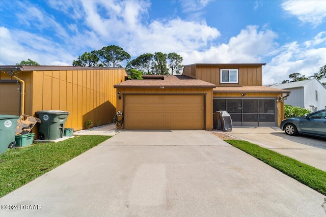 view of front of property with a garage