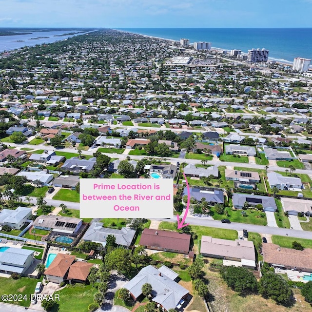 bird's eye view with a water view