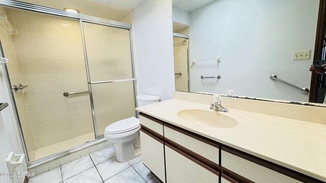 93 Hay Bale Trl, Ormond Beach, FL 32174 - bathroom featuring vanity, toilet, tile patterned floors, and a stall shower