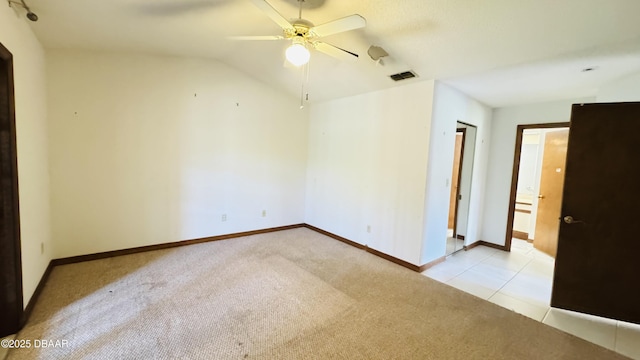93 Hay Bale Trl, Ormond Beach, FL 32174 - tiled spare room featuring carpet flooring, ceiling fan, baseboards, and lofted ceiling