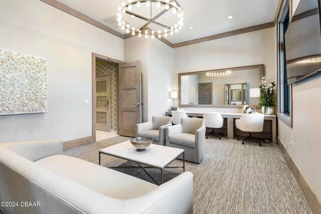 carpeted living room with ornamental molding, a chandelier, and a high ceiling