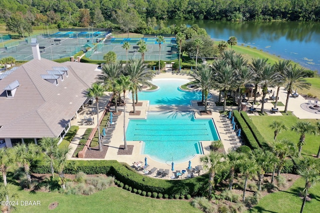 74 Kingsley Ln, Ormond Beach, FL 32174 - drone / aerial view of a pool area and a large body of water