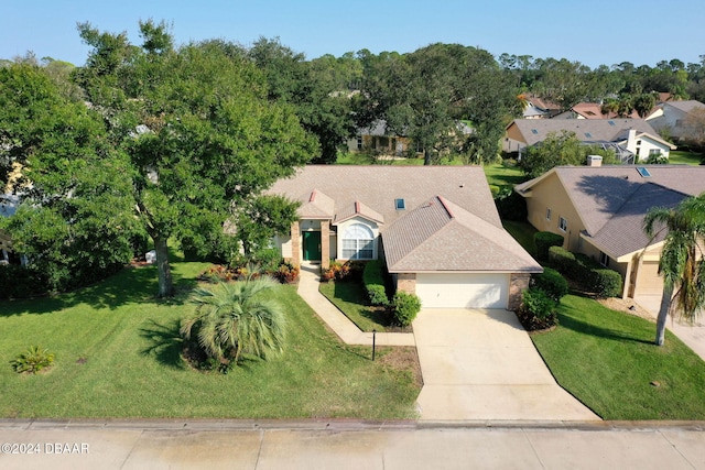 74 Kingsley Ln, Ormond Beach, FL 32174 - view from above of property featuring a tree filled landscape