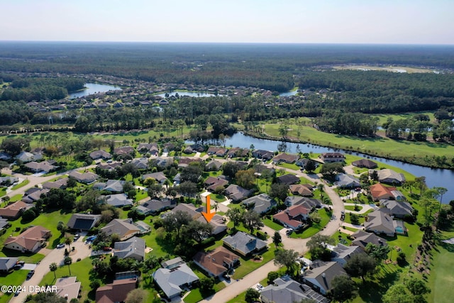 drone / aerial view with a water view