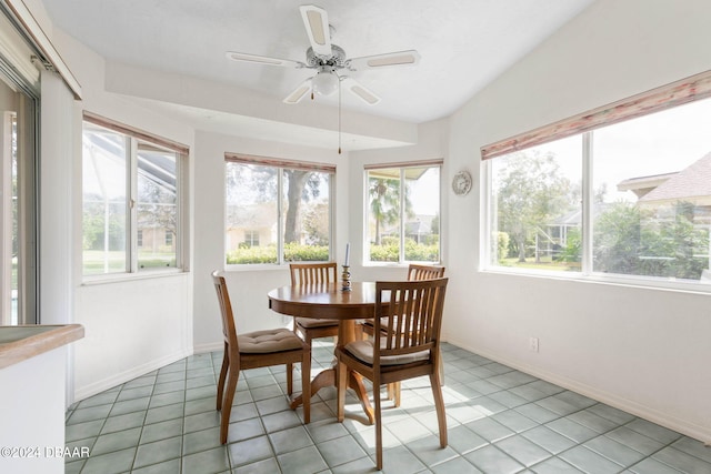 sunroom / solarium featuring ceiling fan