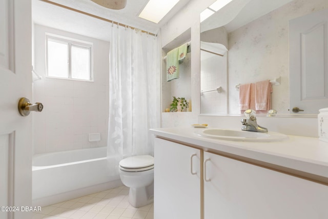 full bathroom with toilet, vanity, tile patterned floors, and shower / bathtub combination with curtain