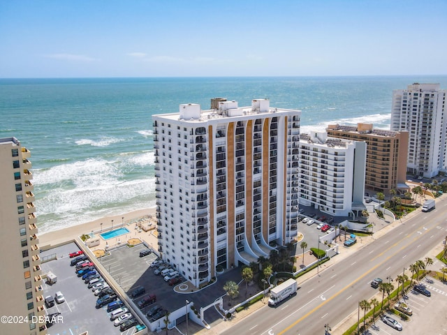 aerial view featuring a water view and a view of the beach