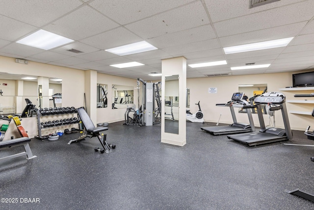1415 Ocean Shore Blvd Unit 808, Ormond Beach, FL 32176 - workout area with a paneled ceiling and baseboards