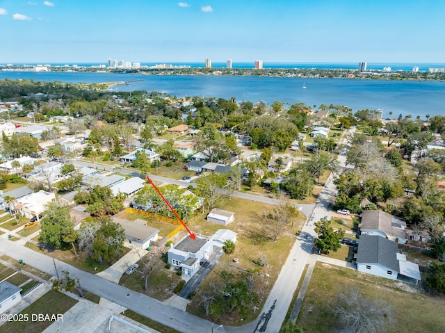 bird's eye view with a water view