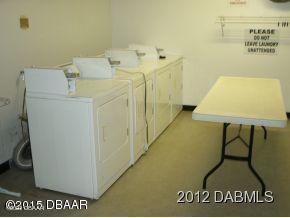 washroom featuring washer and clothes dryer