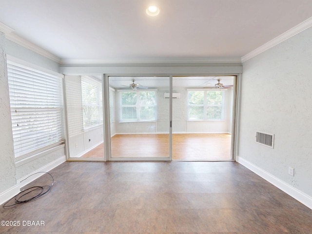 46 Reynolds Ave, Ormond Beach, FL 32174 - spare room featuring an AC wall unit, a ceiling fan, ornamental molding, and baseboards