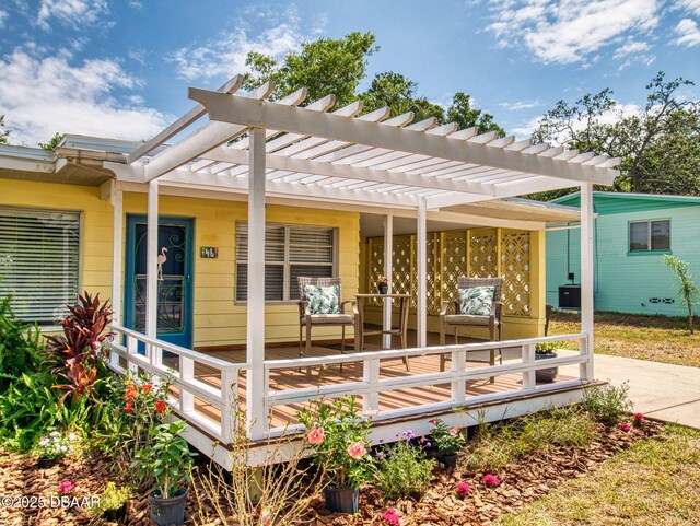46 Reynolds Ave, Ormond Beach, FL 32174 - wooden deck with a pergola and cooling unit