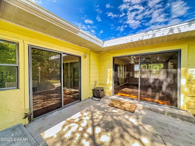 46 Reynolds Ave, Ormond Beach, FL 32174 - view of exterior entry with a patio area