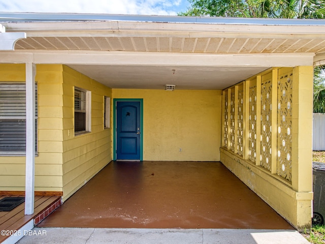 46 Reynolds Ave, Ormond Beach, FL 32174 - view of patio with an attached carport