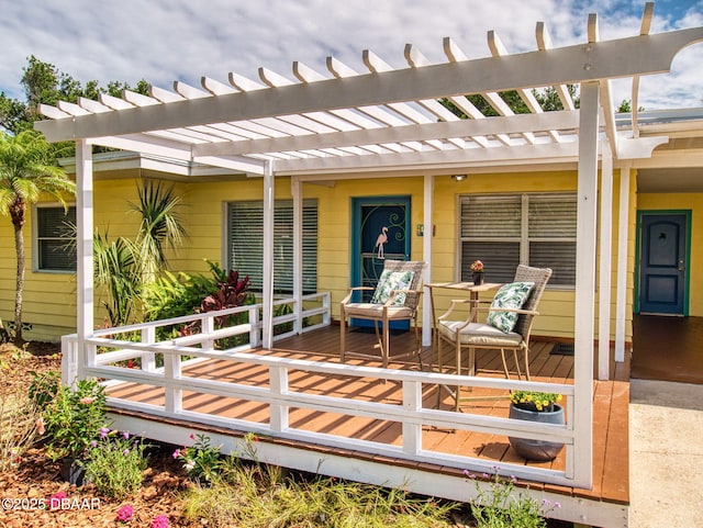 46 Reynolds Ave, Ormond Beach, FL 32174 - view of exterior entry with a pergola and covered porch