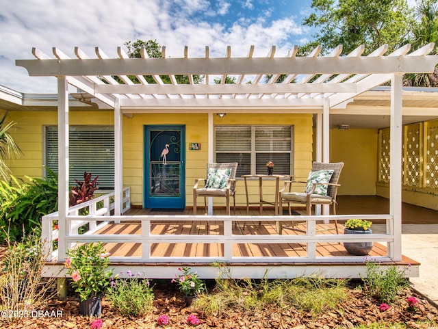 46 Reynolds Ave, Ormond Beach, FL 32174 - entrance to property featuring a pergola and a wooden deck