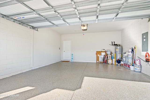 garage featuring electric panel, a garage door opener, and water heater