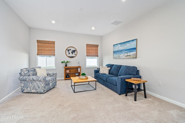 living room featuring light colored carpet