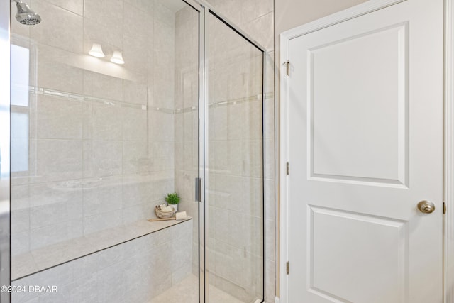 bathroom featuring an enclosed shower