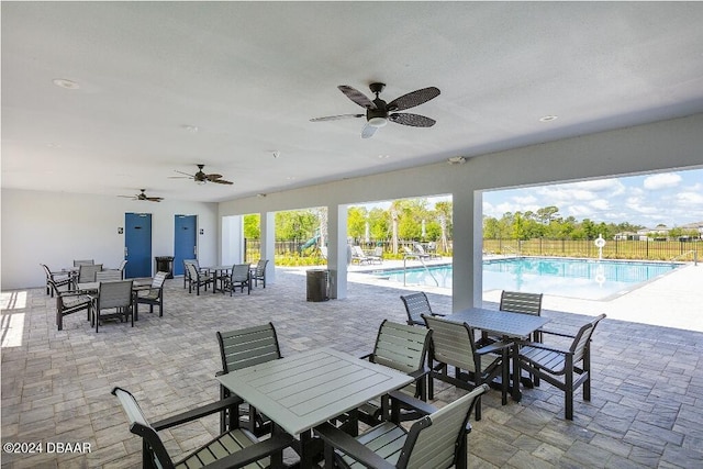 view of patio / terrace featuring a community pool