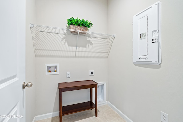 laundry room featuring electric dryer hookup, light tile patterned flooring, and hookup for a washing machine