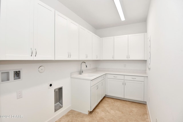 laundry area featuring sink, cabinets, hookup for a gas dryer, hookup for a washing machine, and light tile patterned floors