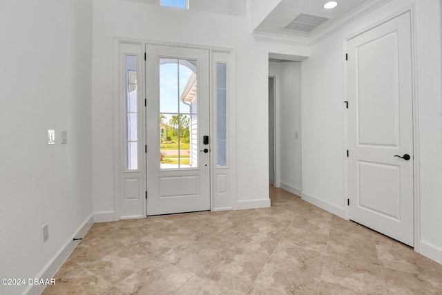 entrance foyer with crown molding