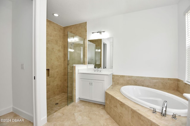 bathroom featuring tile patterned flooring, vanity, and independent shower and bath