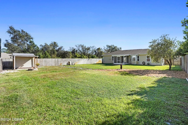 view of yard with a shed