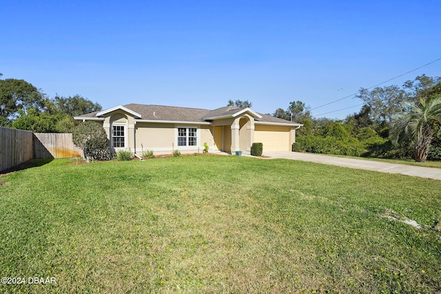 ranch-style house with a garage and a front lawn