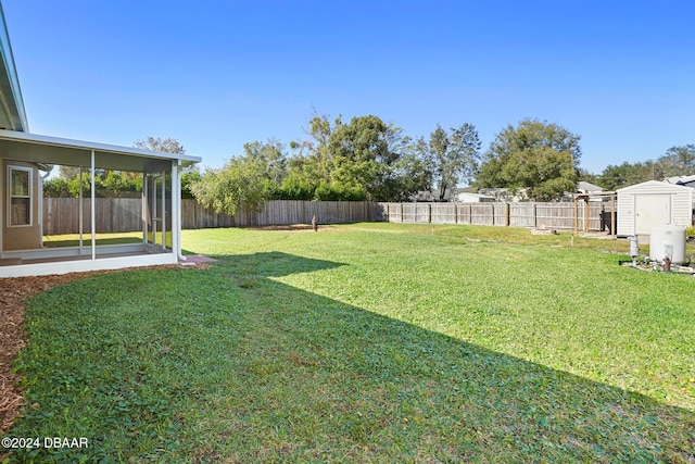 view of yard featuring a storage unit