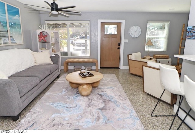 living room featuring ceiling fan