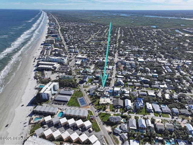 aerial view with a view of the beach and a water view