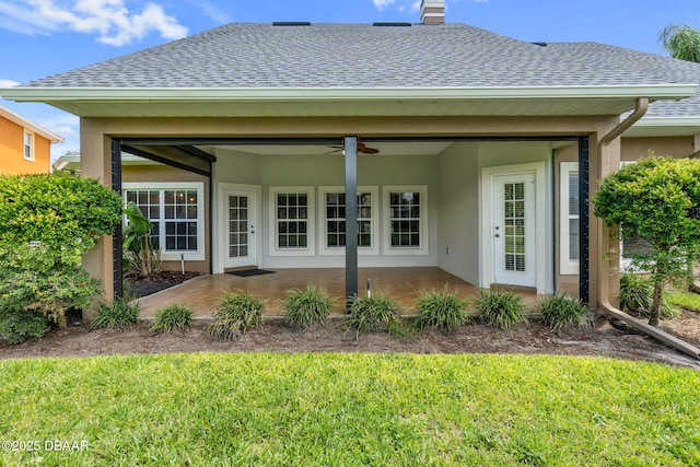 back of house with a yard, ceiling fan, and a patio