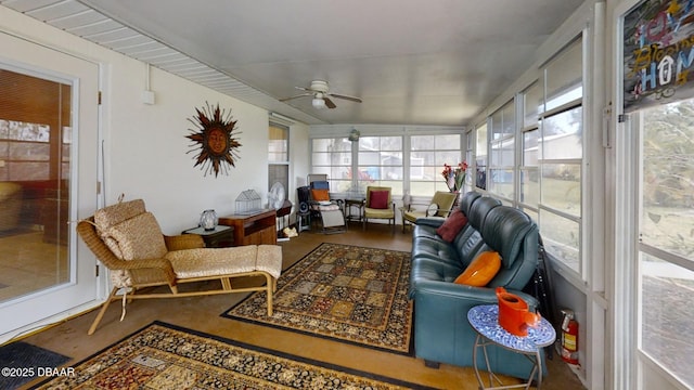 sunroom / solarium with a ceiling fan