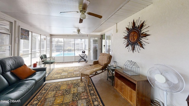 sunroom / solarium with ceiling fan