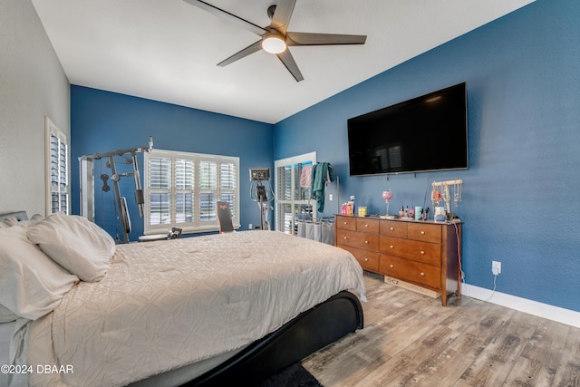 bedroom featuring ceiling fan and wood-type flooring