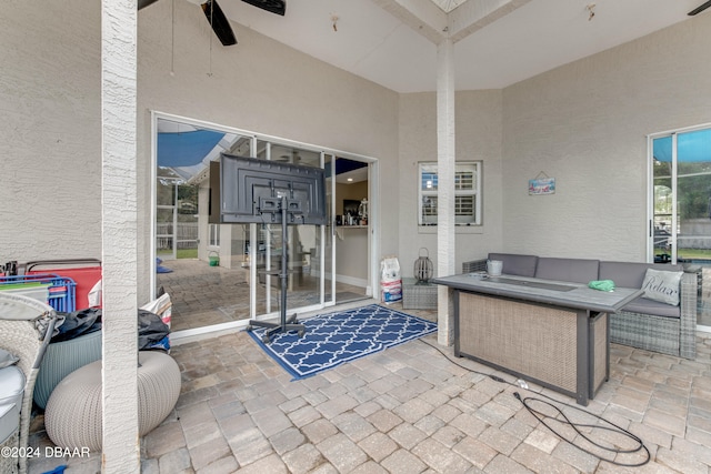 view of patio / terrace featuring an outdoor living space and ceiling fan