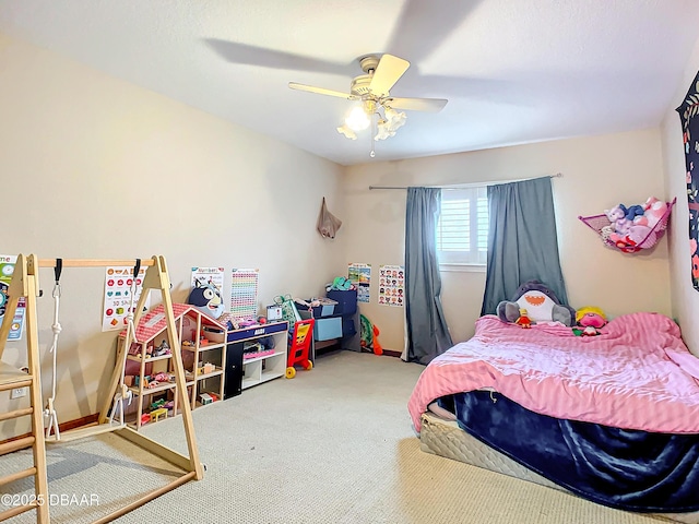 carpeted bedroom with ceiling fan