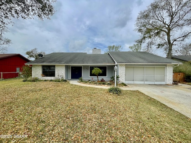 ranch-style house featuring a chimney, concrete driveway, fence, a garage, and a front lawn